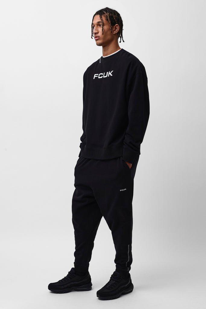 FCUK mustat Unisex joggersit / Black